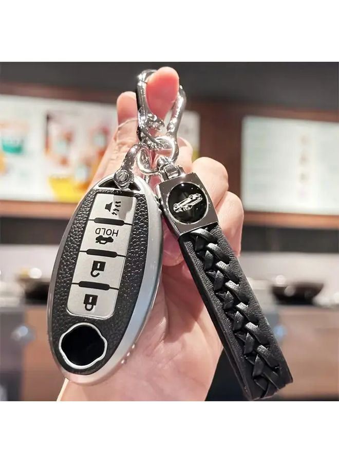 غطاية مفتاح TPU فضية مع حبل للتعليق لسيارات نيسان ألتيما ماكسيما مورانو روغ سينترا - Image 1